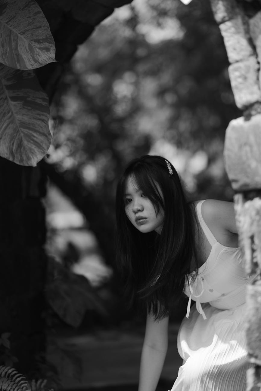 young woman in black and white portrait outdoors
