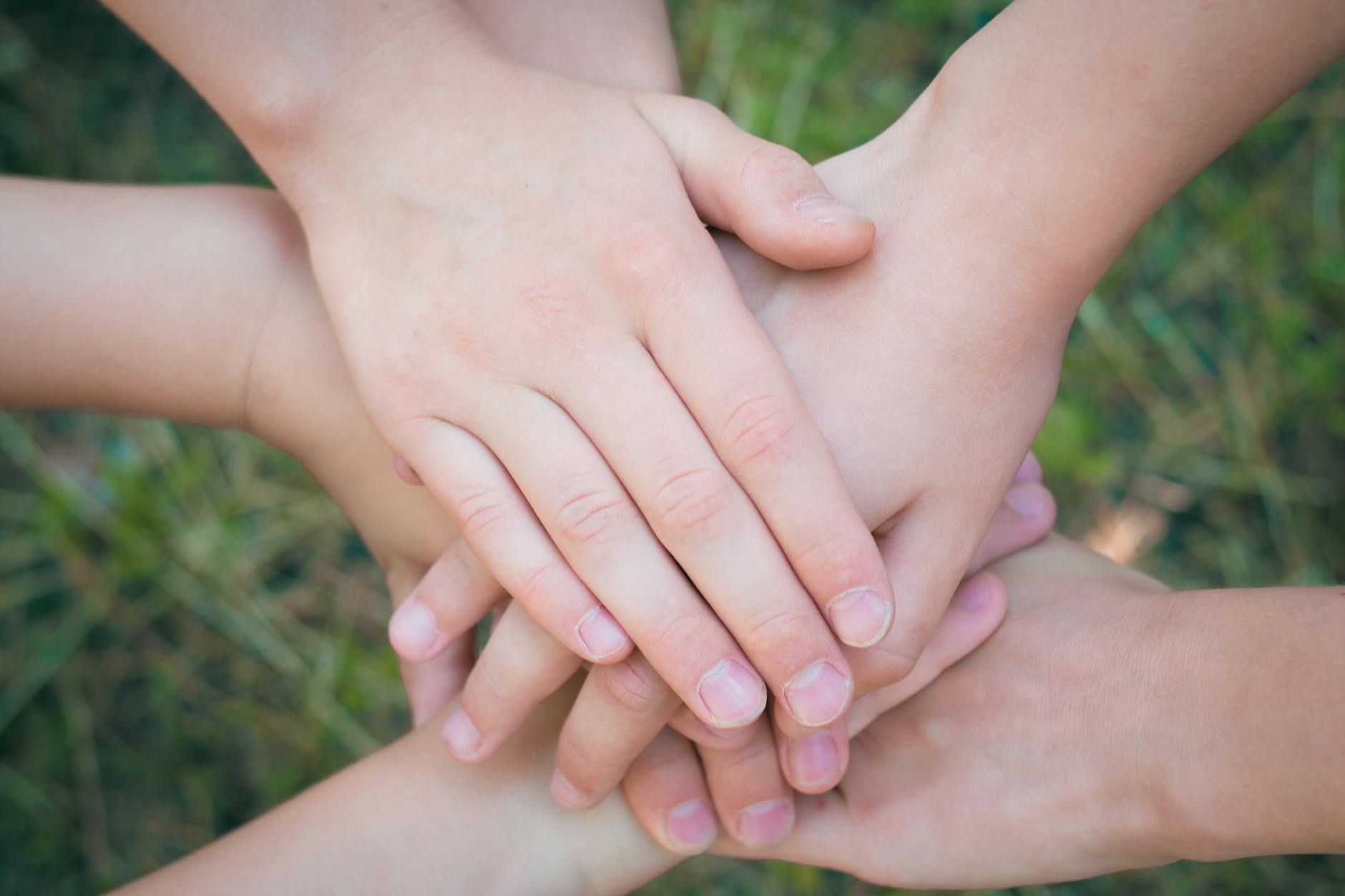 hands clasped together