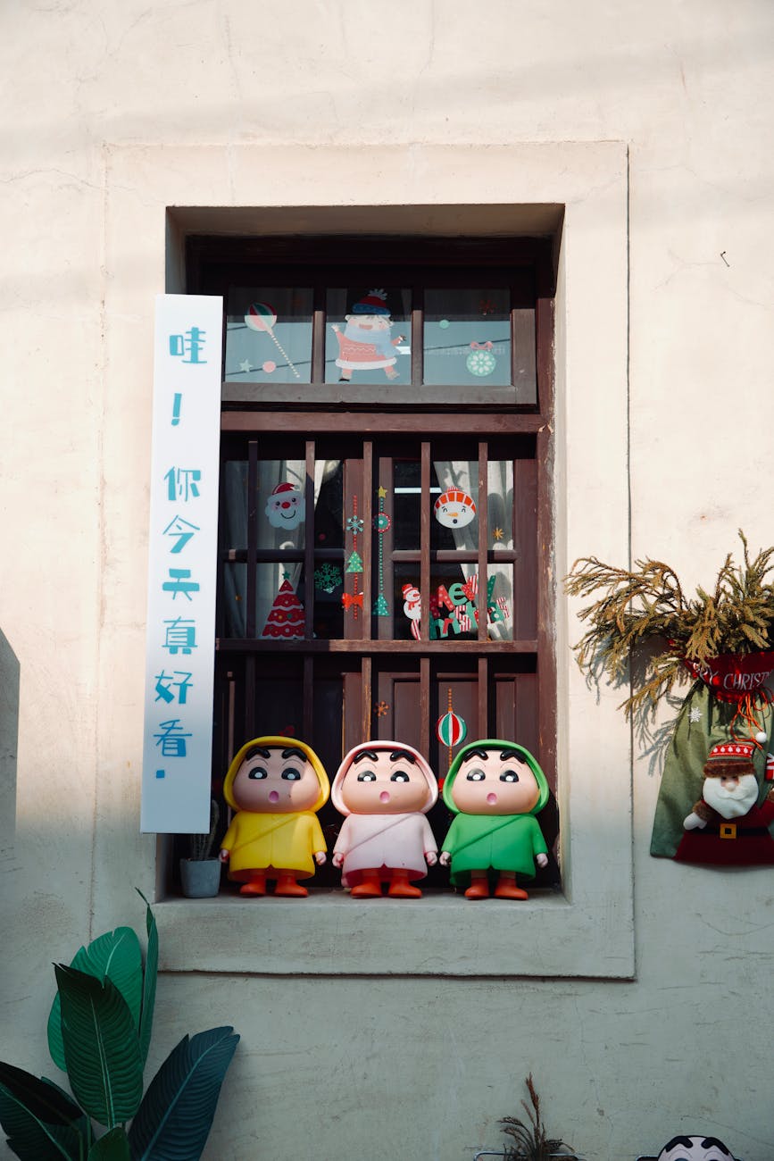 festive window display with cute figurines